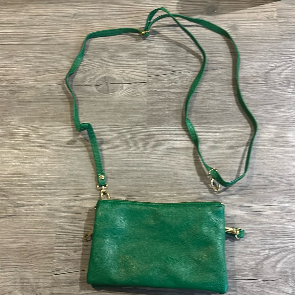 green purse with card holders, wristlet and purses strap
